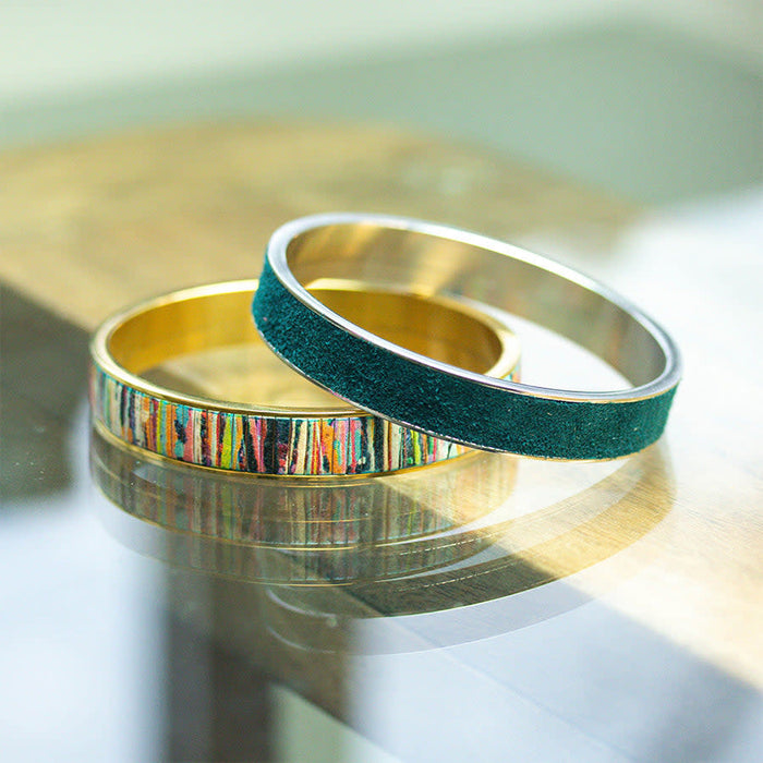 Rhodium Plated Bangle with Twist Off Bezel