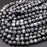 Larvikite 4mm Faceted Round Bead Strand