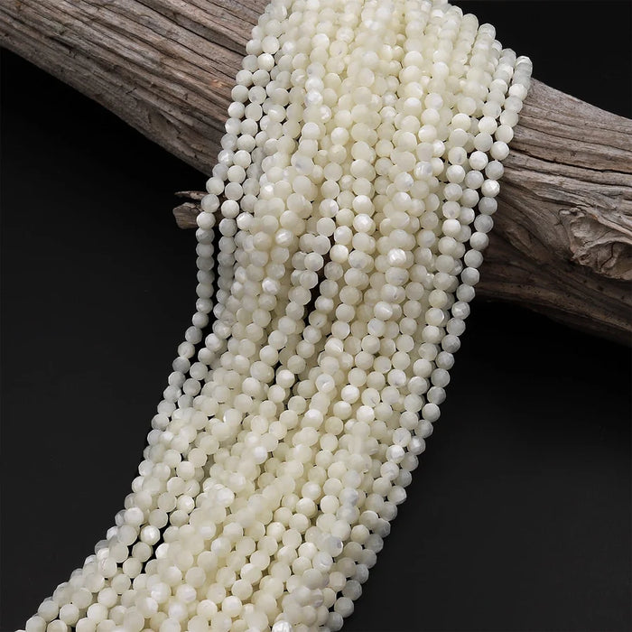 Natural Mother of Pearl 2mm Faceted Round Bead Strand - AAA Grade