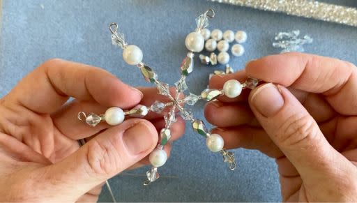 How to Make a Beaded Wire Snowflake Ornament featuring Dazzle It Wire Frames