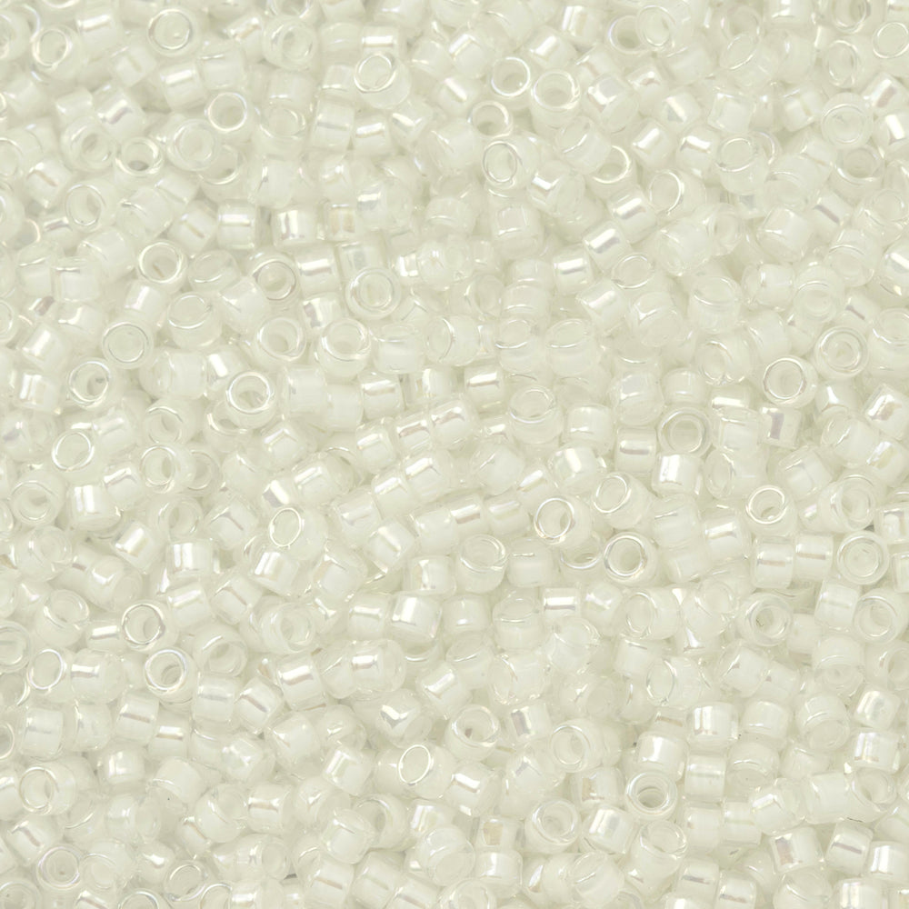 Toho Aiko Seed Beads, 11/0 #777 'Creme-Lined Crystal Rainbow' (4 Grams)