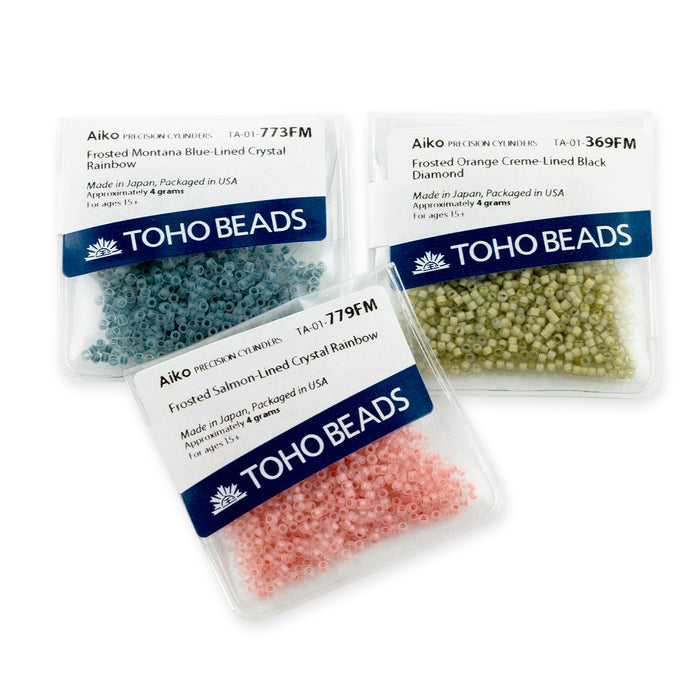 Toho Treasure 11/0 OPAQUE YELLOW-LINED AQUA Seed Beads