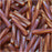 Miyuki Bugle Tube Beads, Twisted Cylinder 12x2.7mm, Matte Transparent Dark Topaz AB (13 Grams)