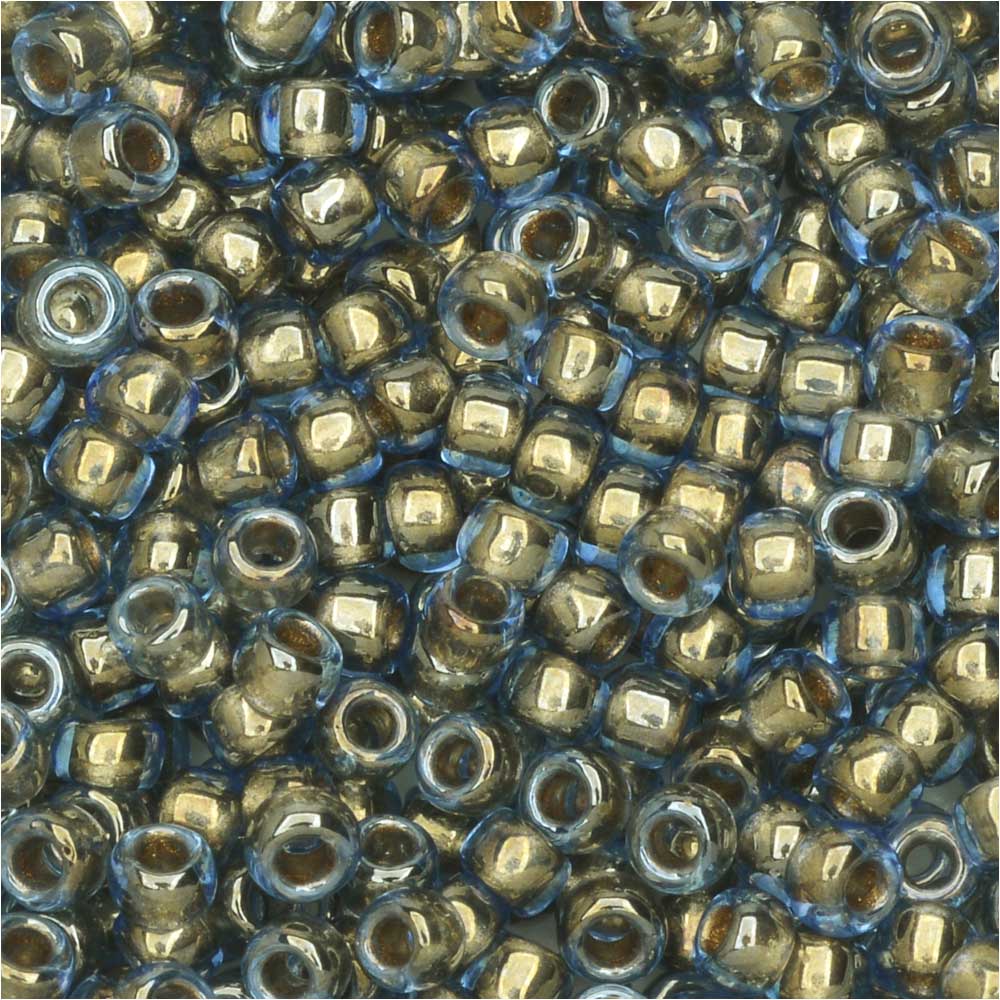 Toho Seed Beads, Round 8/0 #992 'Gold Lined Light Montana Blue' (8 Grams)