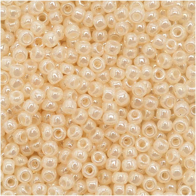 Toho Round 6/0 Seed Beads Silver Lined Milky Lt. Topaz (2.5 Tube)