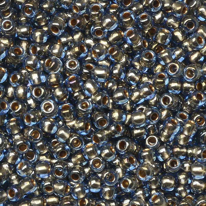 Toho Seed Beads, Round 11/0 #992 'Gold Lined Light Montana Blue' (8 Grams)