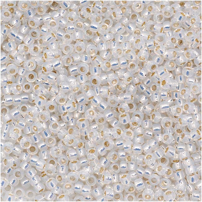 Toho Round Seed Beads 15/0 2100 Silver Lined Milky White 8 Gram Tube
