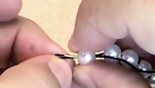 How to End a Knotted Strand of Pearls