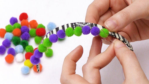 How to Embroider Pom Poms onto Cotton Cord Using Blanket Stitch